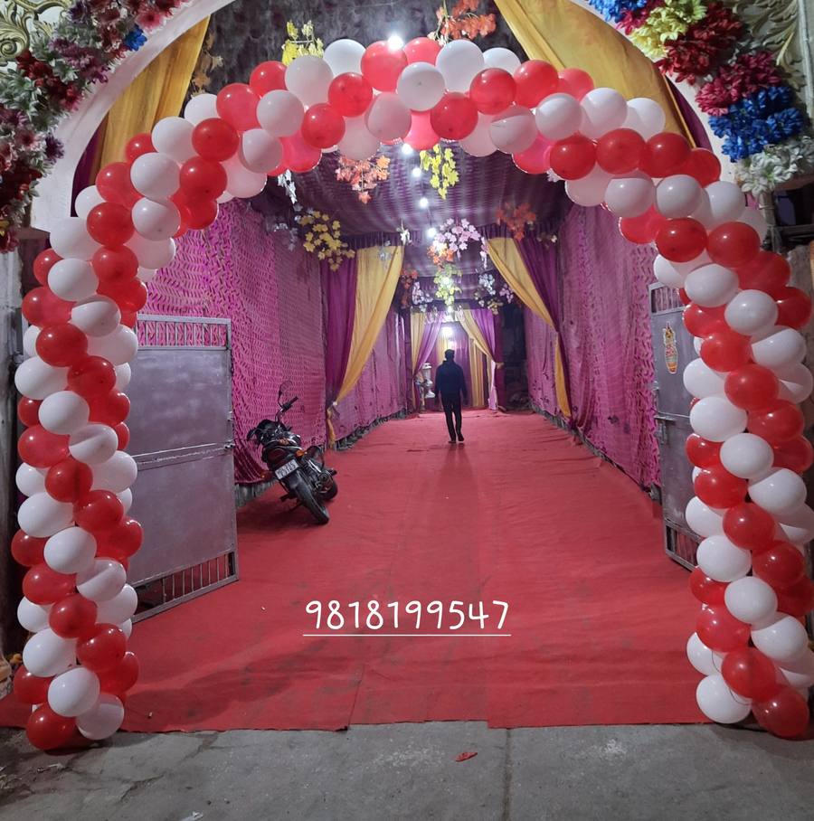Red white balloon arch entrance